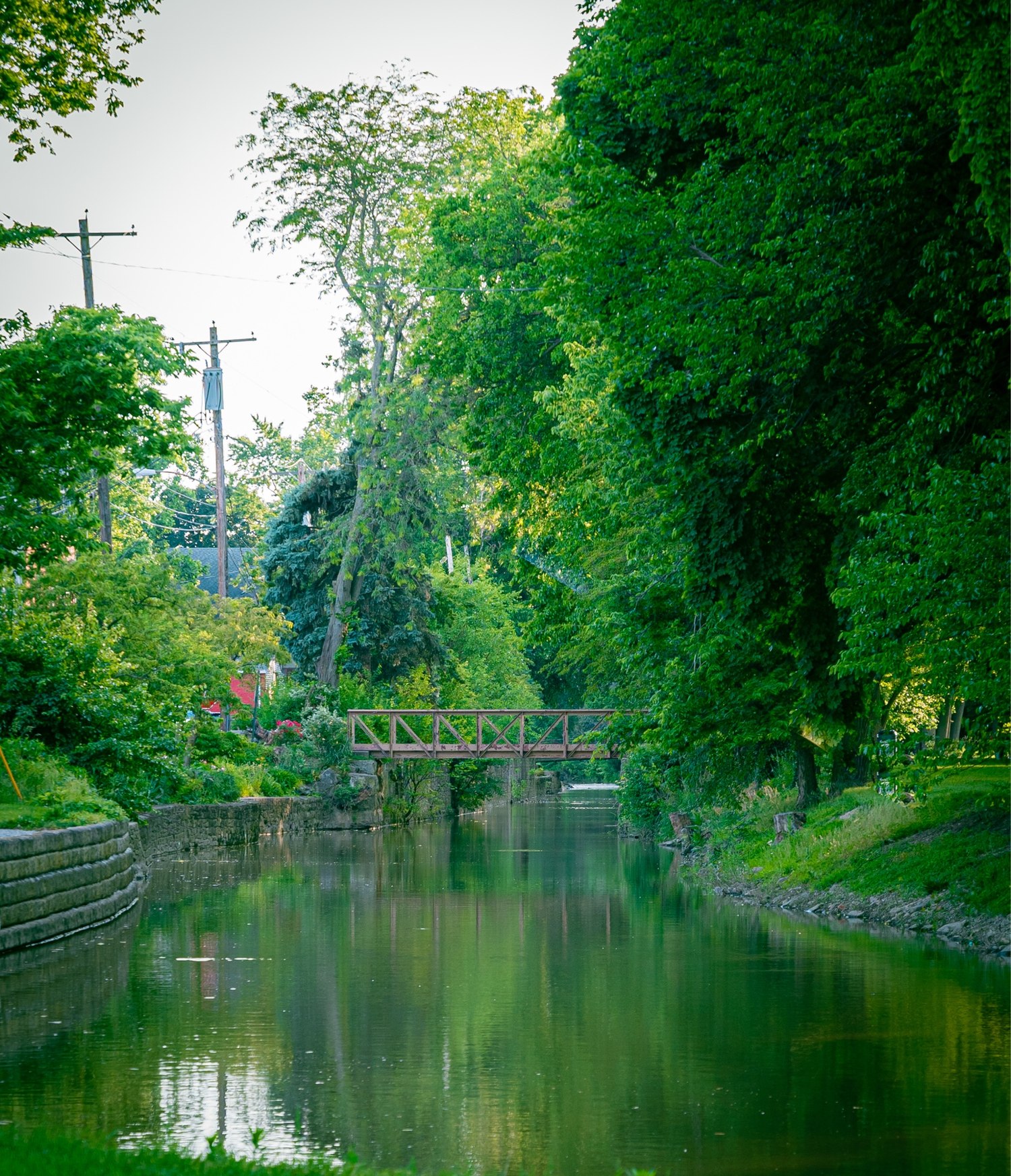 A quiet footbridge over the canal near the towpath in Grand Rapids, Ohio